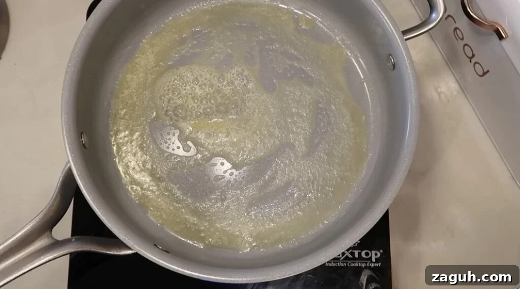 Creamy Garlic Sauce Recipe for Pasta, Chicken, and Veggies 4 Butter melted in sauté pan