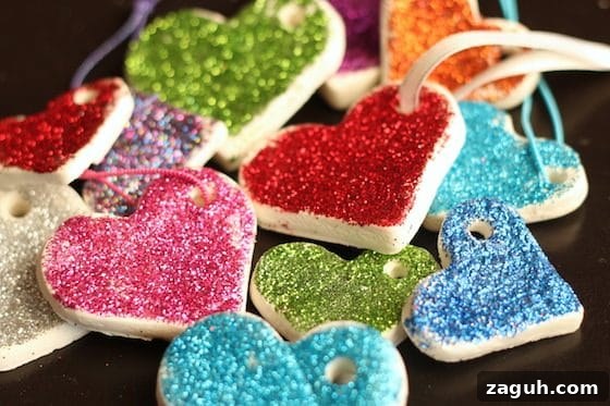 11 Valentine’s Day Crafts for Tweens and Teens to Make Together 8 pile of glittered white clay dough heart ornaments