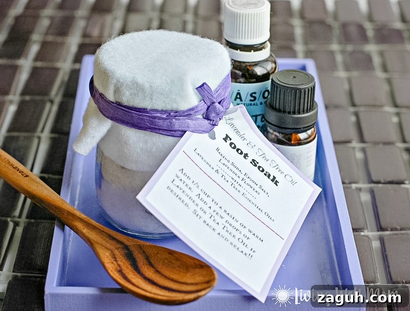 Lavender Epsom Salt Foot Soak Recipe for Relaxation 6 homemade lavender foot soak with label in purple tray with essential oils