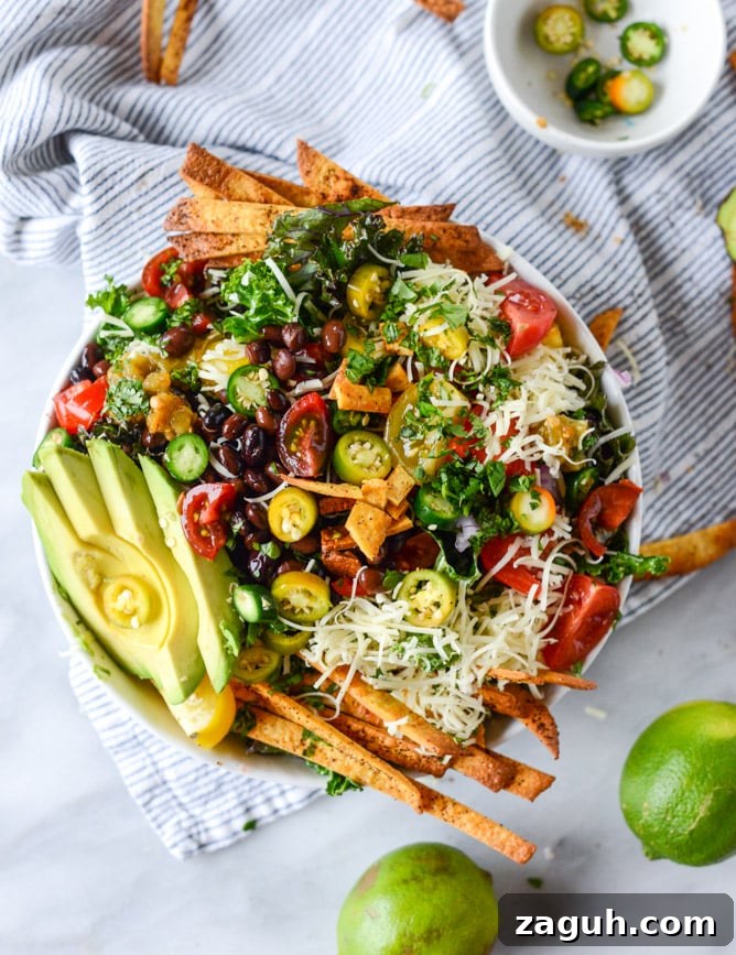 Crunchy Taco Kale Salad Recipe with Avocado & Lime Dressing 2 crunchy taco kale salad I howsweeteats.com