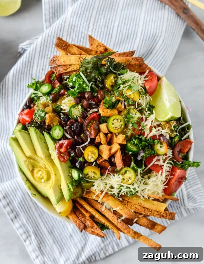 Crunchy Taco Kale Salad Recipe with Avocado & Lime Dressing 11 crunchy taco kale salad I howsweeteats.com