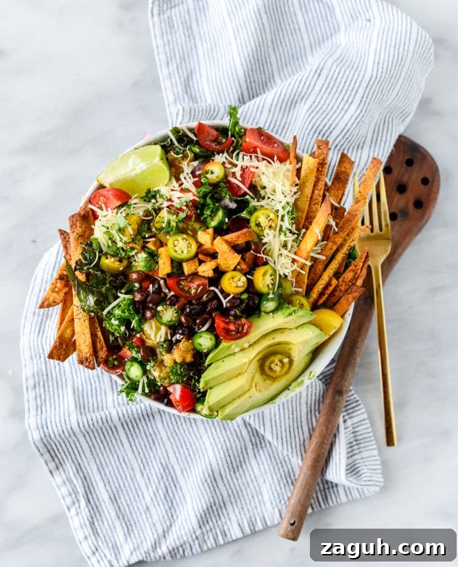 Crunchy Taco Kale Salad Recipe with Avocado & Lime Dressing 6 crunchy taco kale salad I howsweeteats.com