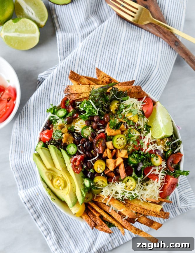 Crunchy Taco Kale Salad Recipe with Avocado & Lime Dressing 8 crunchy taco kale salad I howsweeteats.com