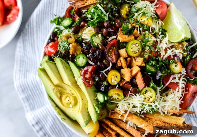 Crunchy Taco Kale Salad Recipe with Avocado & Lime Dressing 9 crunchy taco kale salad I howsweeteats.com