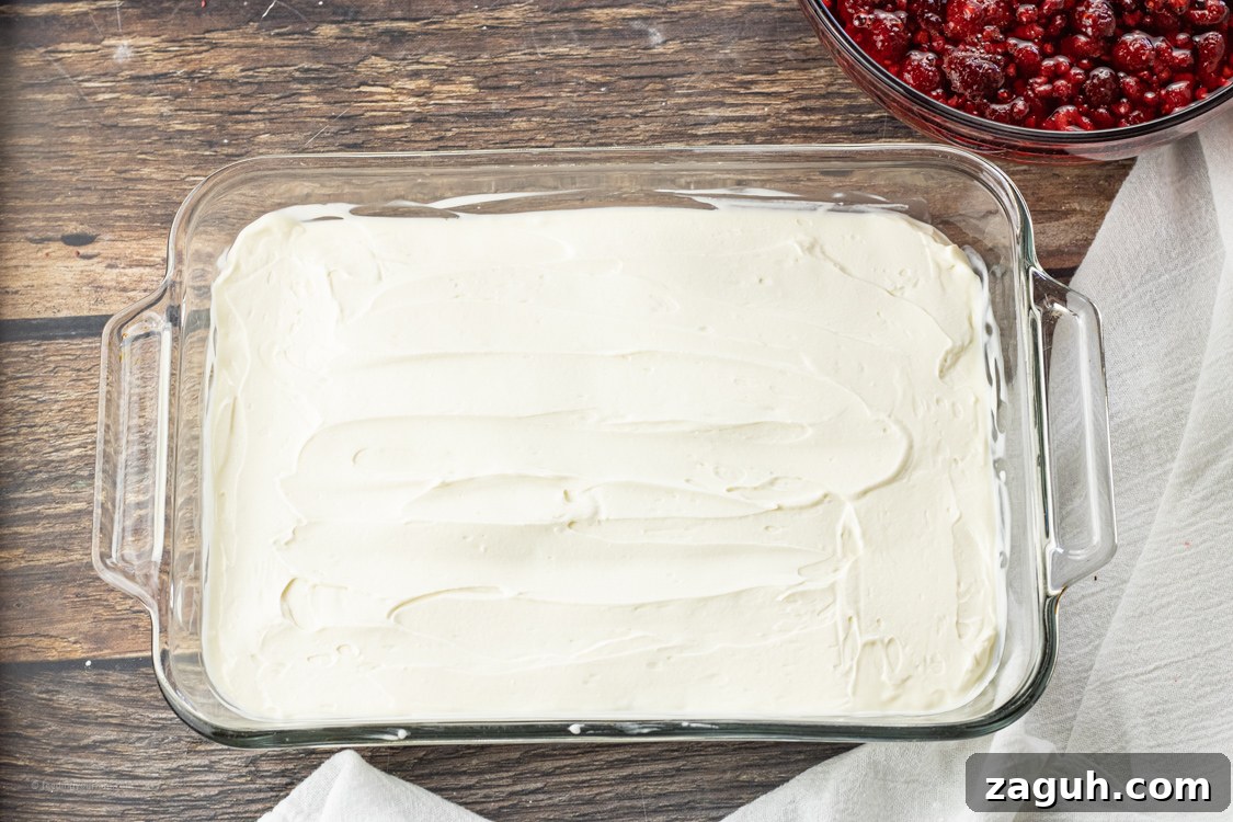 Creamy Raspberry Pretzel Salad with Sweet Cream Cheese Topping 5 cream layer on jello salad