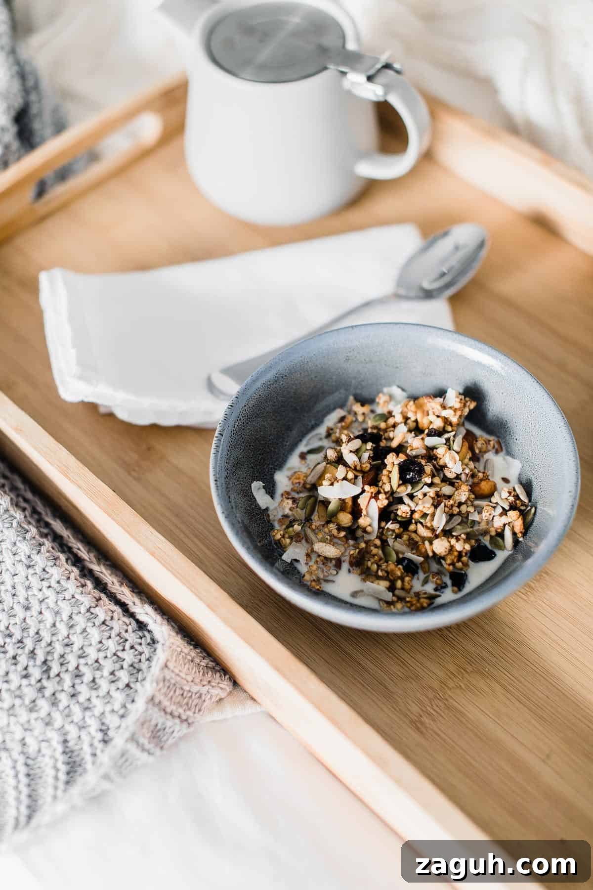 Muesli vs Oatmeal: Which Breakfast Cereal Suits Your Diet? 3 Muesli in a bowl on a wood tray