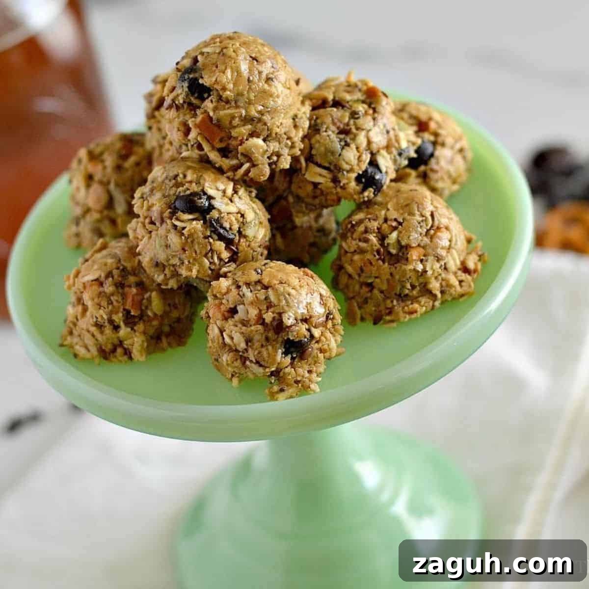 Muesli vs Oatmeal: Which Breakfast Cereal Suits Your Diet? 6 protein balls on a jadeite stand