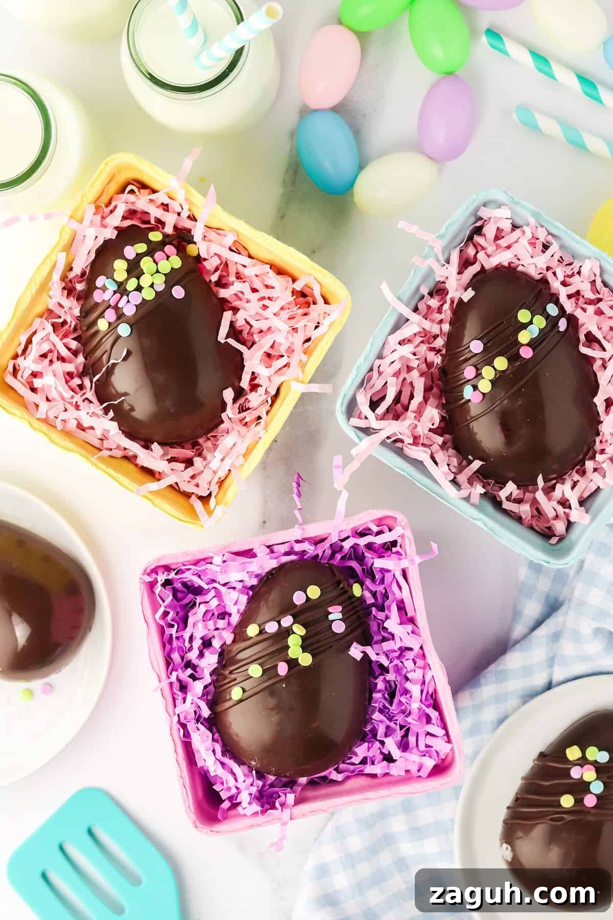 How to Make Copycat Cadbury Creme Egg Candy at Home 12 Easter celebration with Creme Egg Candy nestled in colorful shredded paper, accompanied by pastel decorations and milk bottles.