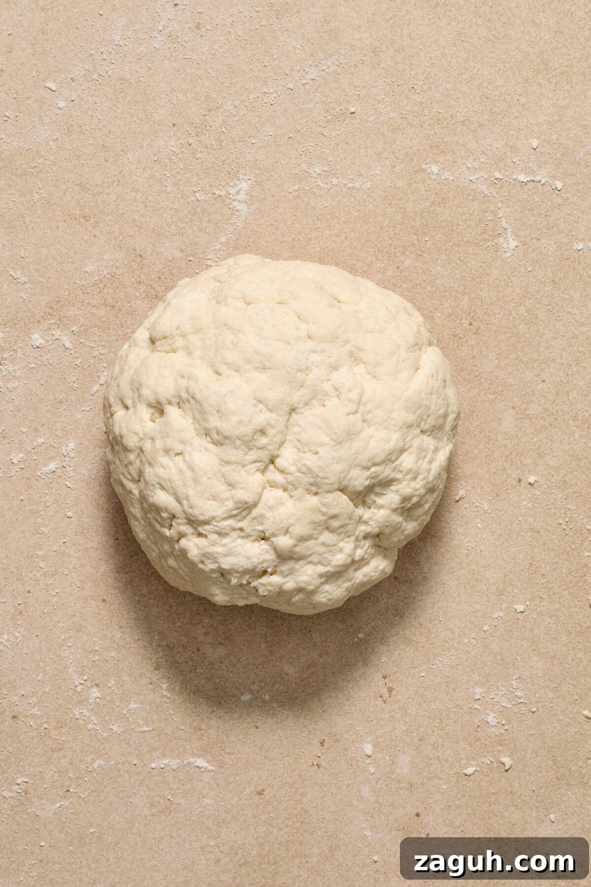 Ball of dough on surface. 