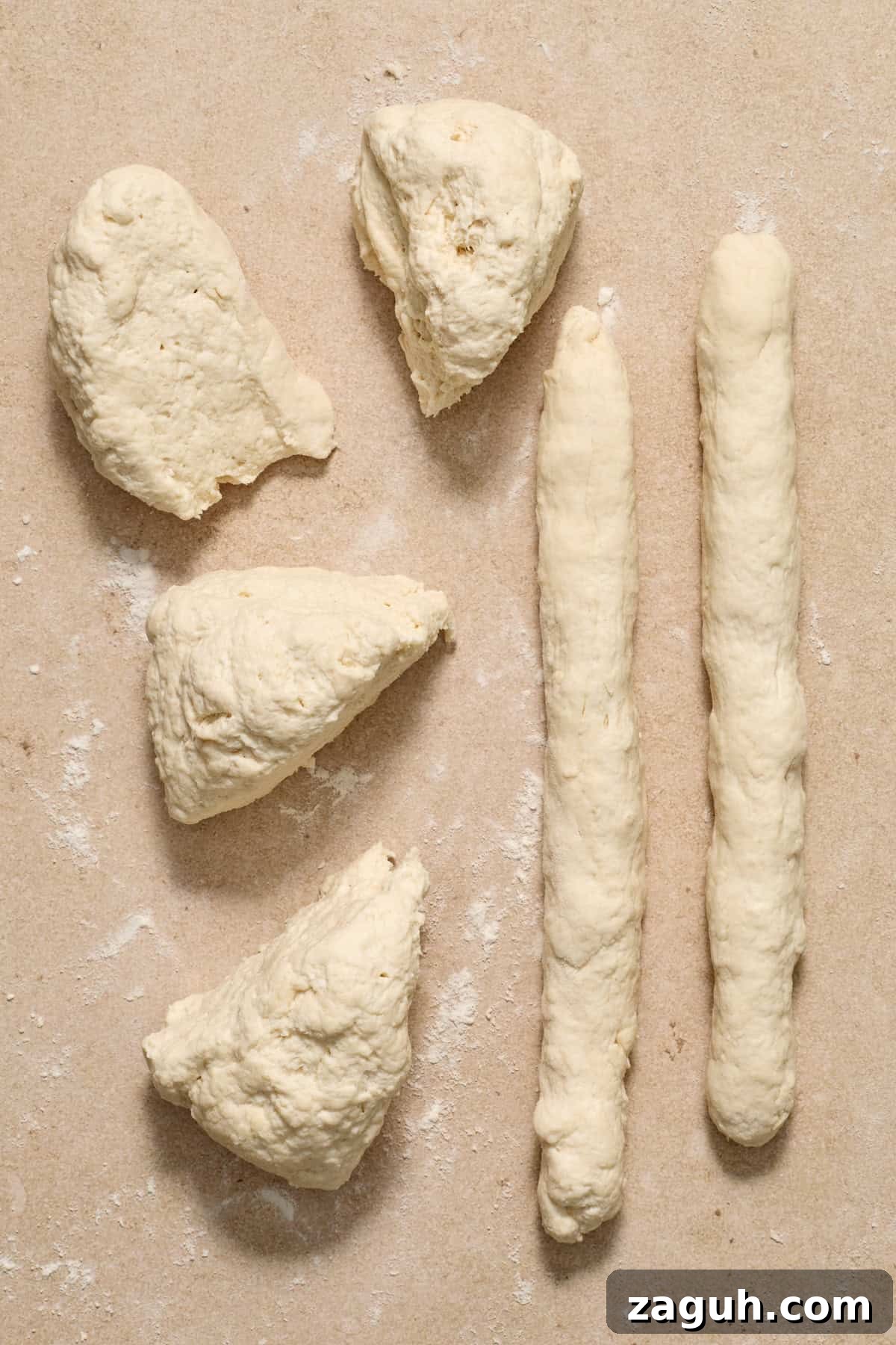 Rolled out dough on floured surface.