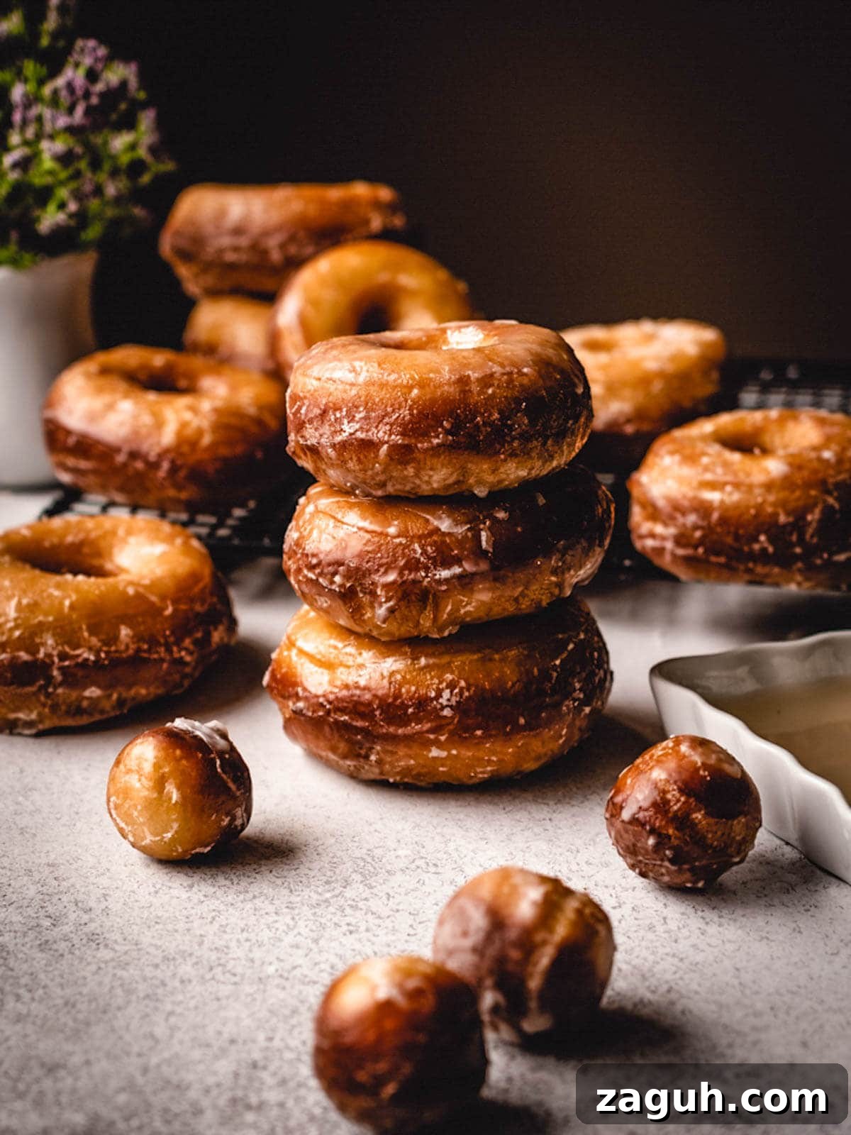 Classic Glazed Donuts: Soft, Shiny, Homemade Recipe 4 Perfect stack of glazed donuts.