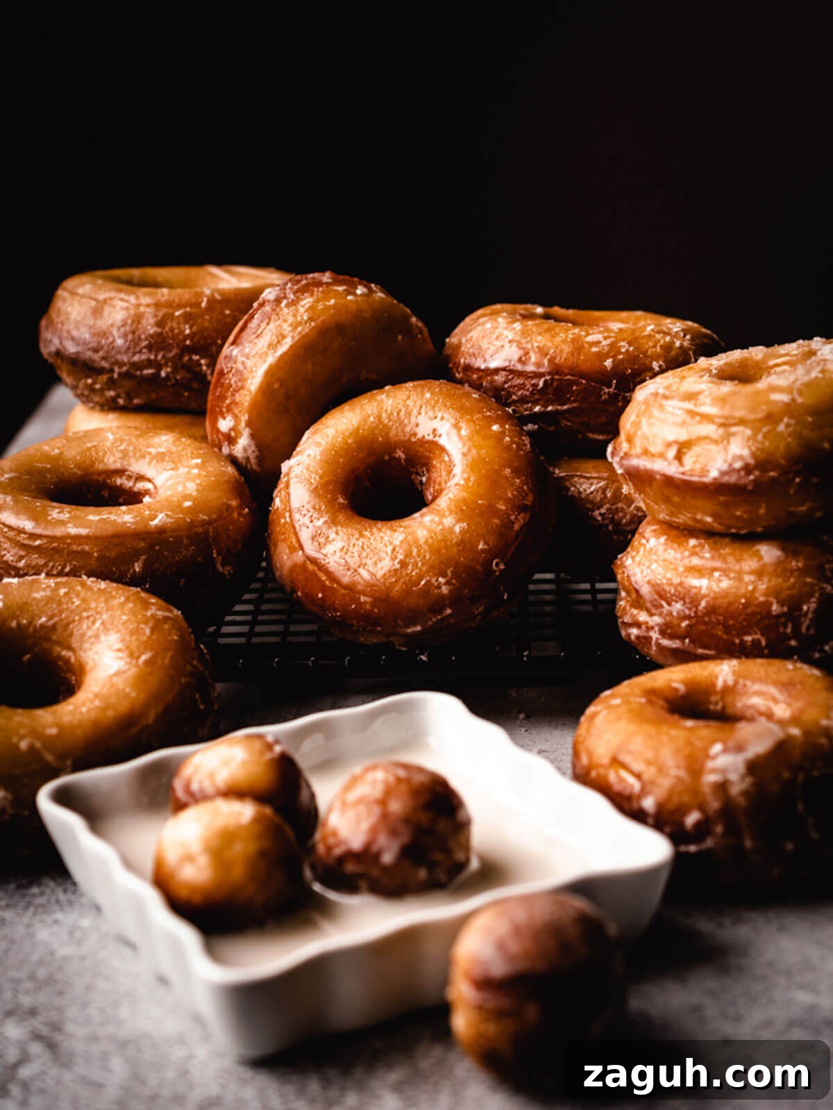 Classic Glazed Donuts: Soft, Shiny, Homemade Recipe 7 Delicious glazed donuts ready to be eaten.