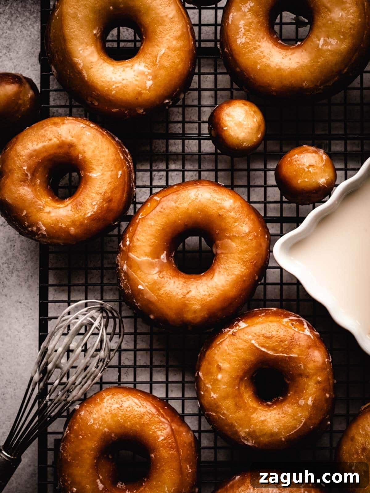 Classic Glazed Donuts: Soft, Shiny, Homemade Recipe 8 Perfectly glazed donuts.