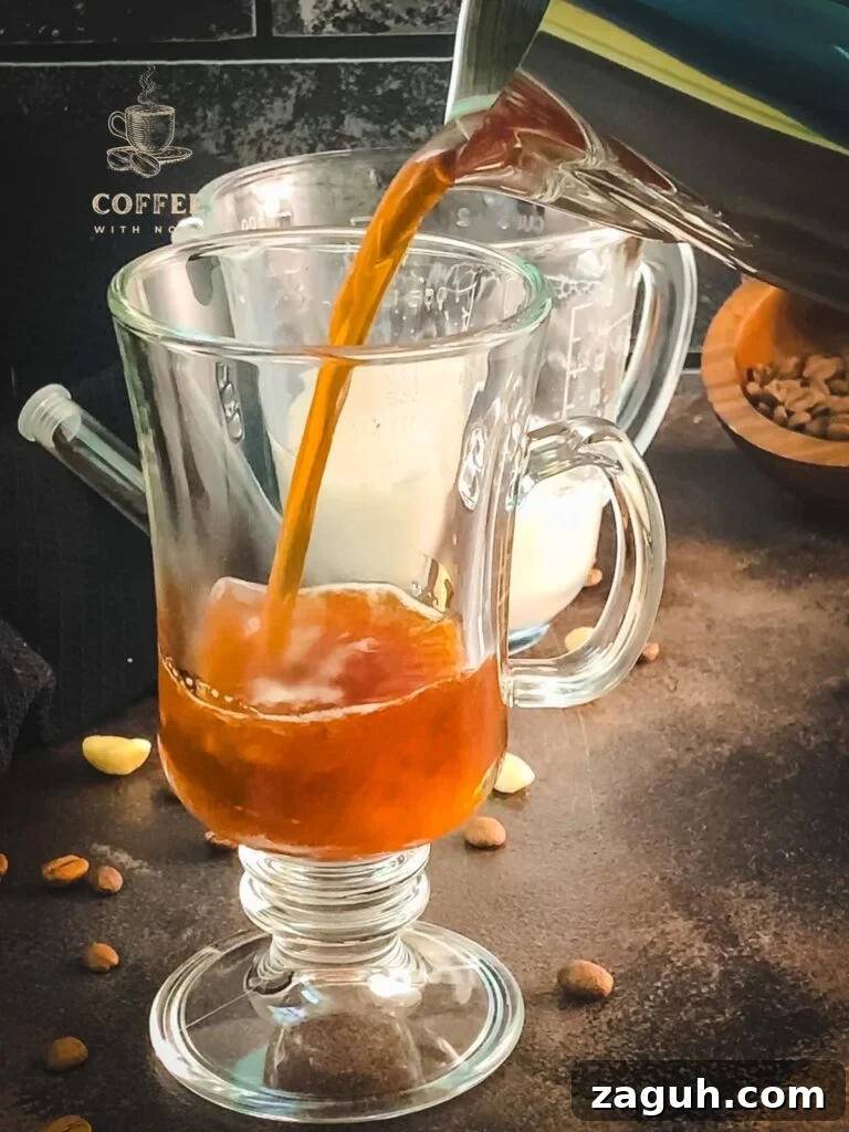 Homemade Vanilla Coffee with Creamy Vanilla Milk Recipe 3 Pour coffee into the serving glass.