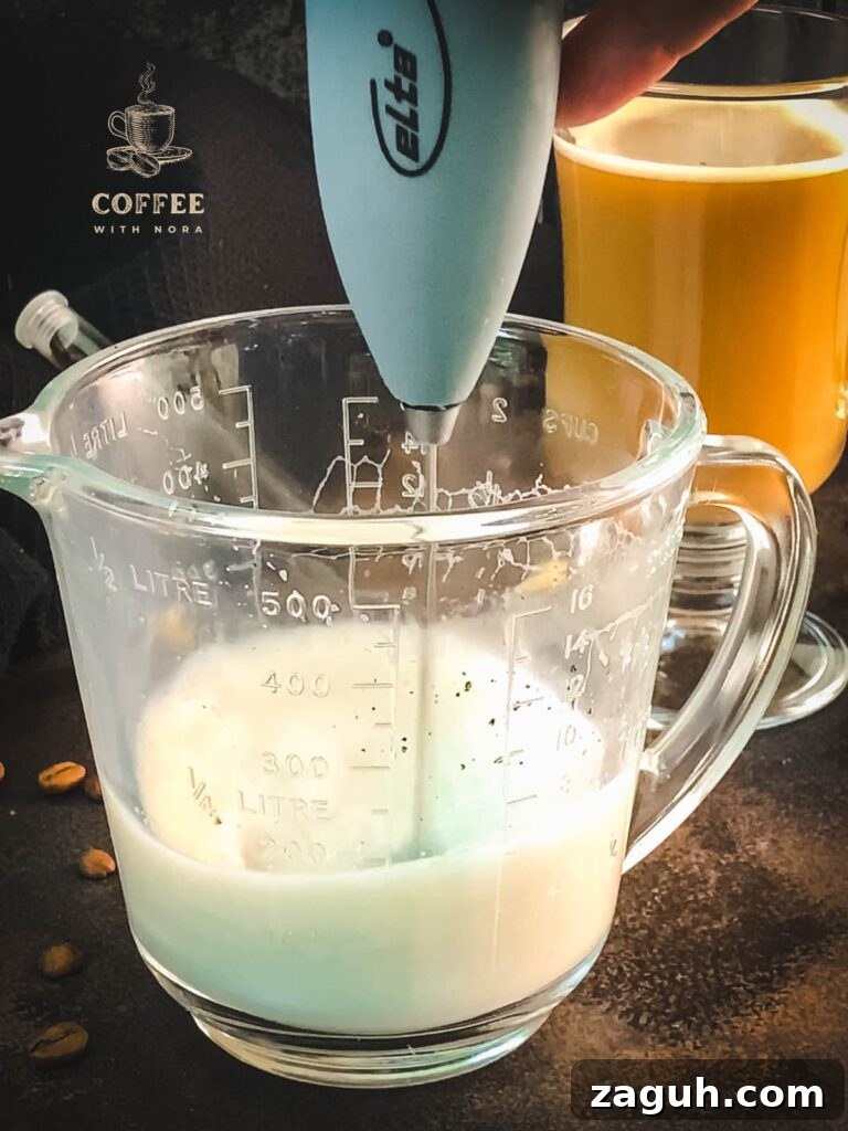 Homemade Vanilla Coffee with Creamy Vanilla Milk Recipe 5 Froth the vanilla milk using a milk frother.