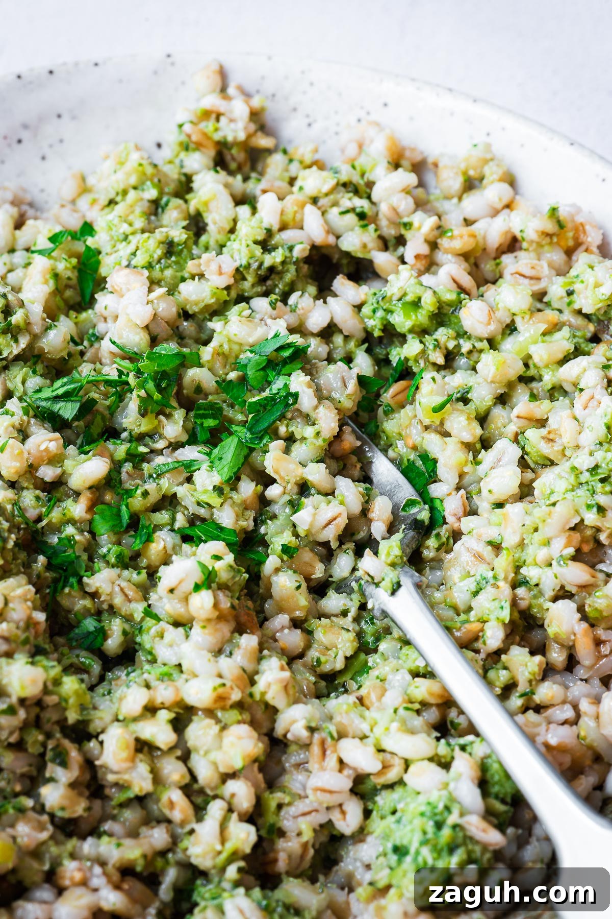 How to Cook Barley: Instant Pot and Stovetop Methods 6 Close-up of cooked barley with pesto.