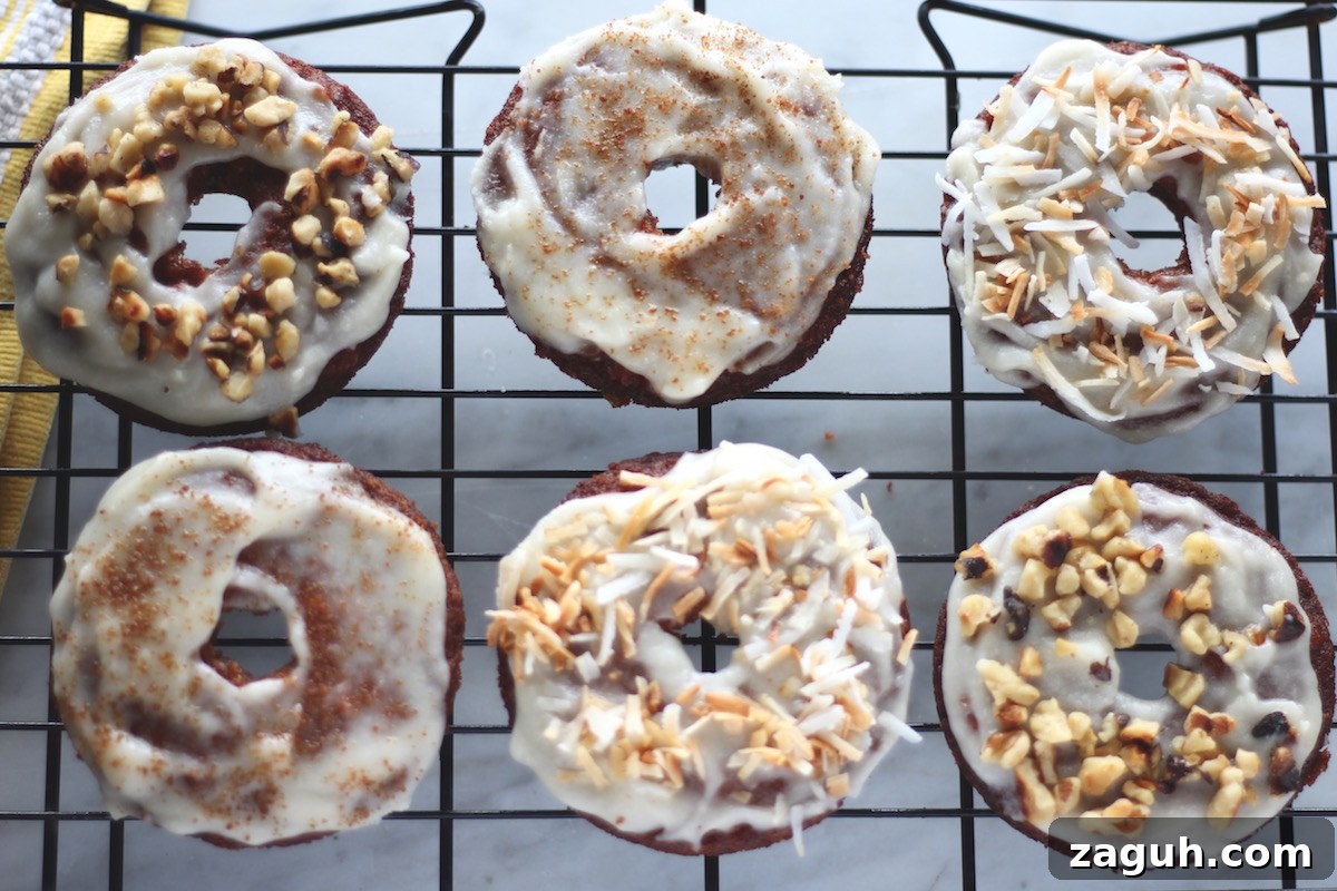 Paleo Carrot Cake Donuts - grain-free, dairy-free baked donuts with all the flavors of carrot cake! These donuts could be dessert or breakfast! | fedandfulfilled.com