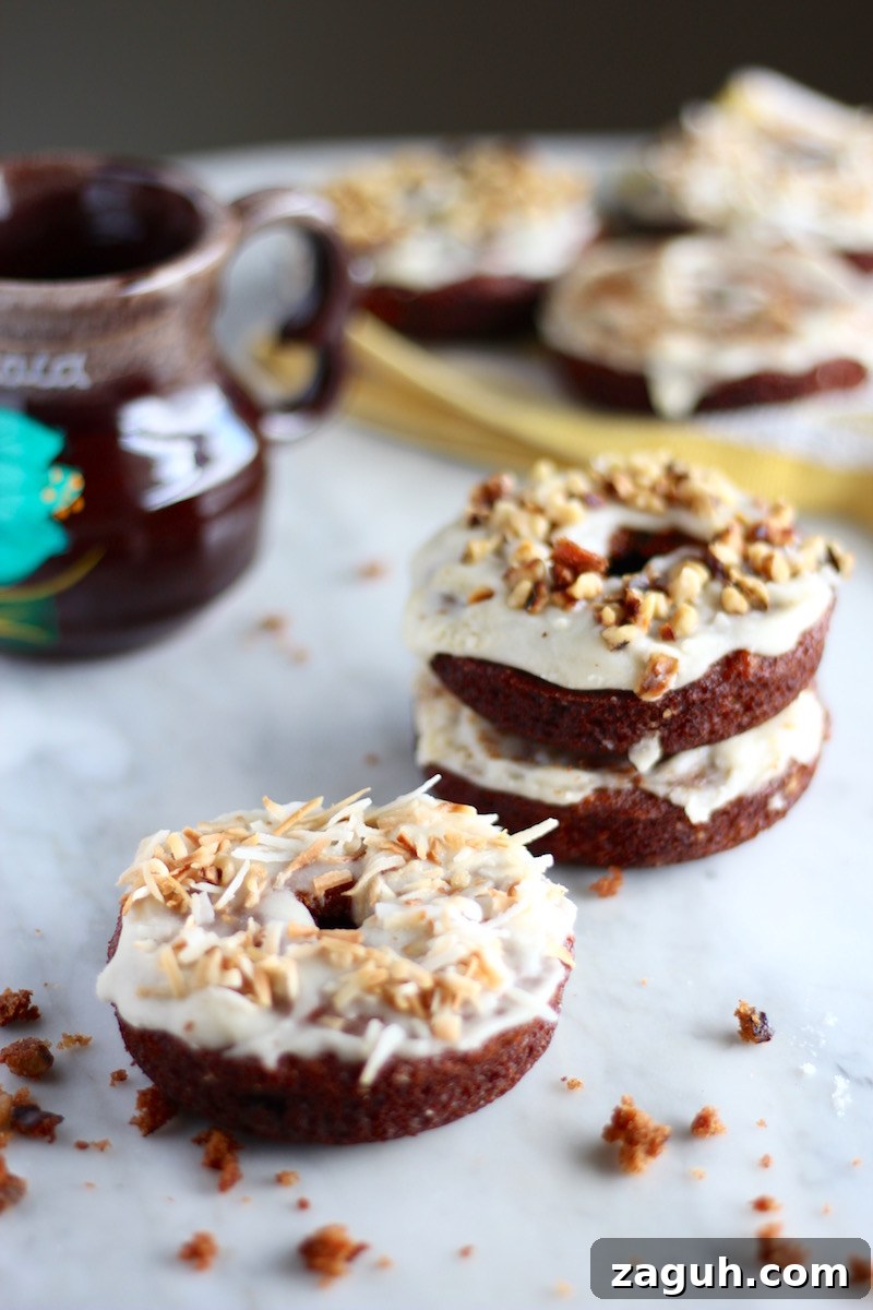 Paleo Carrot Cake Donuts - these grain-free treats taste rich and decadent, but they are healthy enough that you could eat them for breakfast! | fedandfulfilled.com