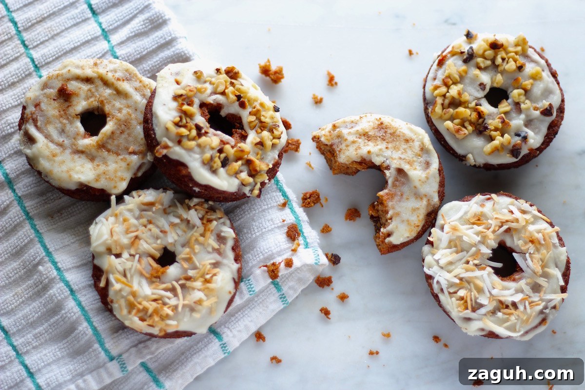 Paleo Carrot Cake Donuts - soft, coconut butter-glazed carrot cake donuts that are grain-free, gluten-free, nut-free, and refined sugar-free! | fedandfulfilled.com