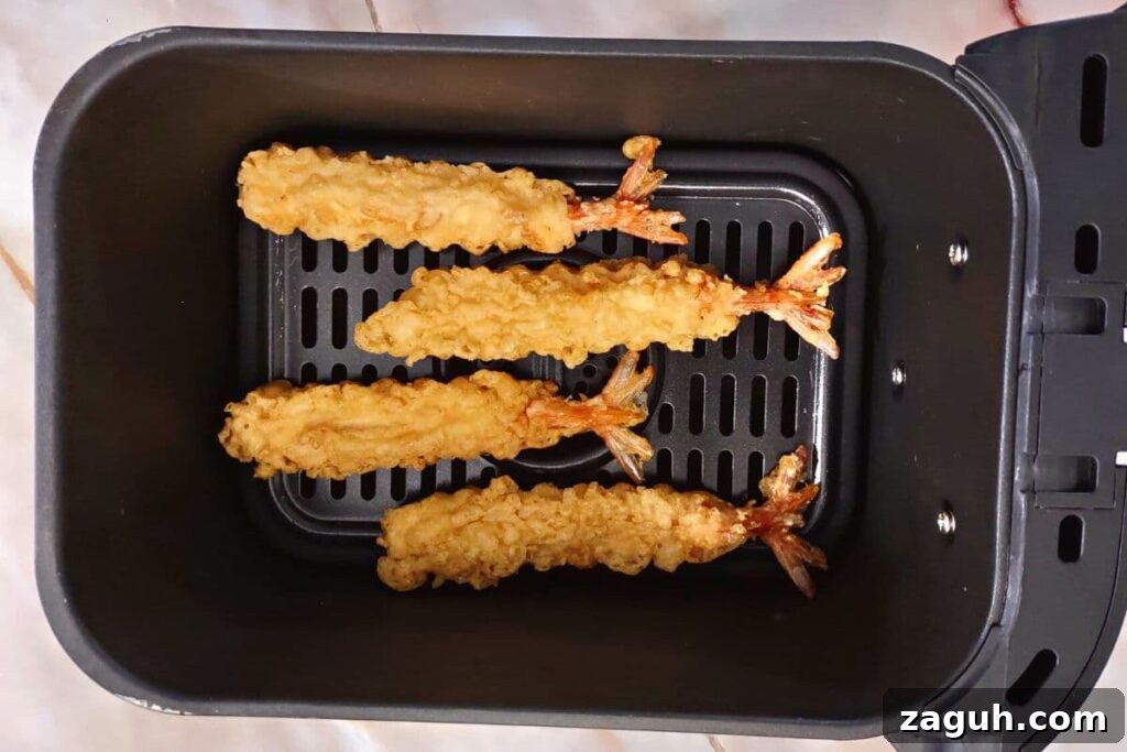 Crispy Air-Fryer Tempura Shrimp from Aldi Frozen Pack 5 place frozen tempura shrimp in air fryer basket
