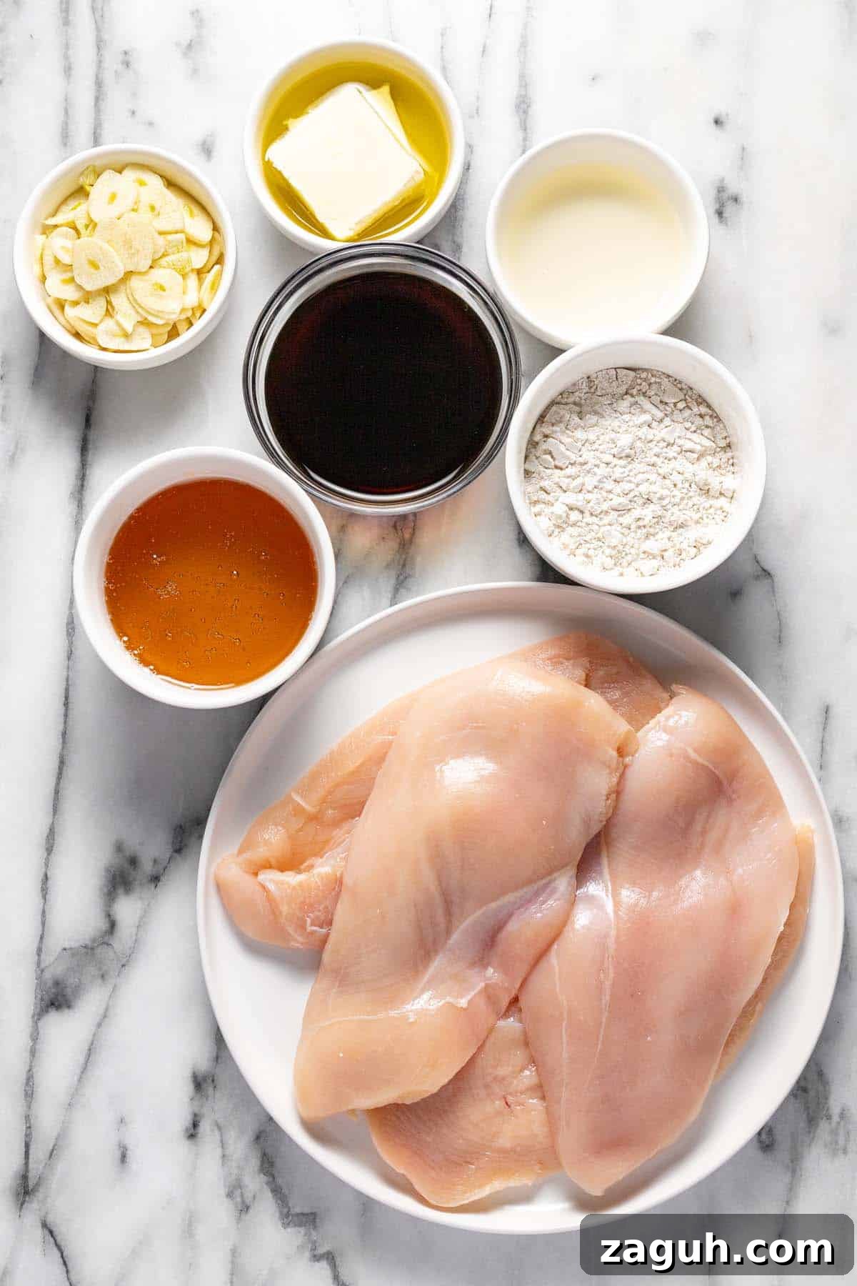 20-Minute Garlic Chicken with Honey Glaze 3 Bowls of ingredients to make garlic chicken with honey.
