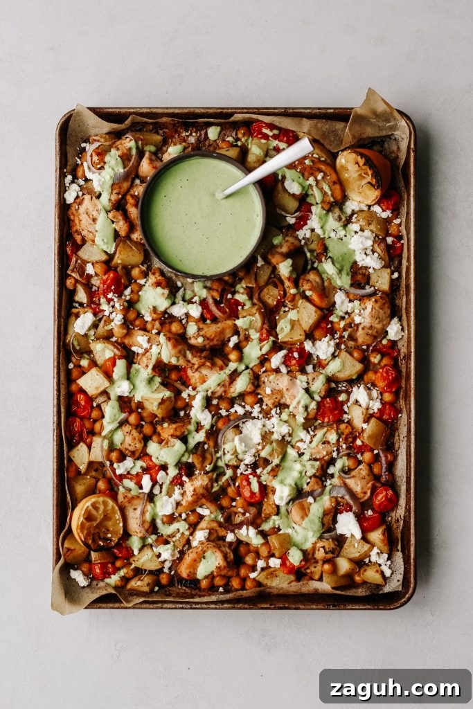 Green Goddess Sheet-Pan Chicken with Roasted Veggies 4 chicken and veggies on sheet pan with green yogurt sauce