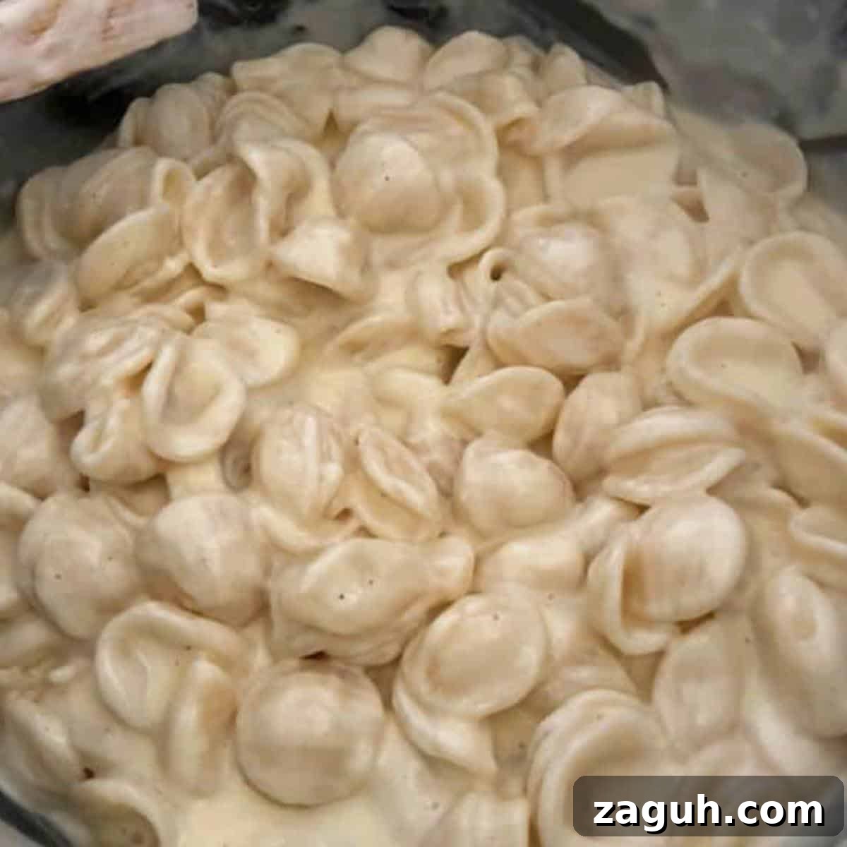 Creamy White Cheddar Mac and Cheese Recipe for Dinner 8 White cheddar mac and cheese finished in skillet.