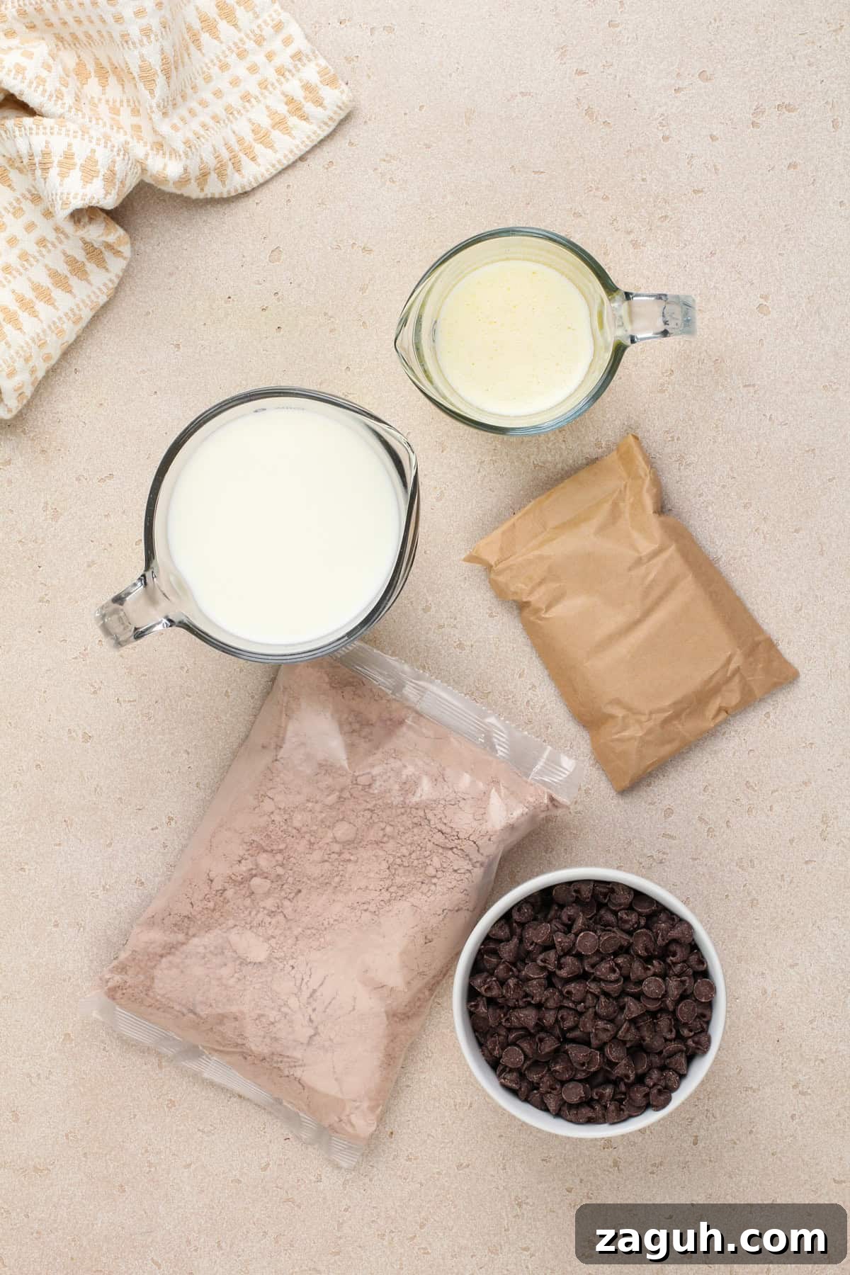 Decadent Chocolate Dump Cake Recipe That Melts in Minutes 5 Chocolate dump cake ingredients arranged on a countertop.