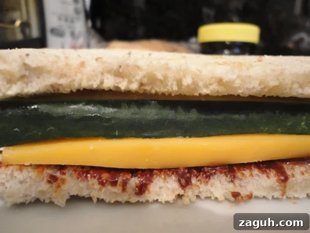 Sandwich made with marmite, Cheddar Cheese and Cucumber
