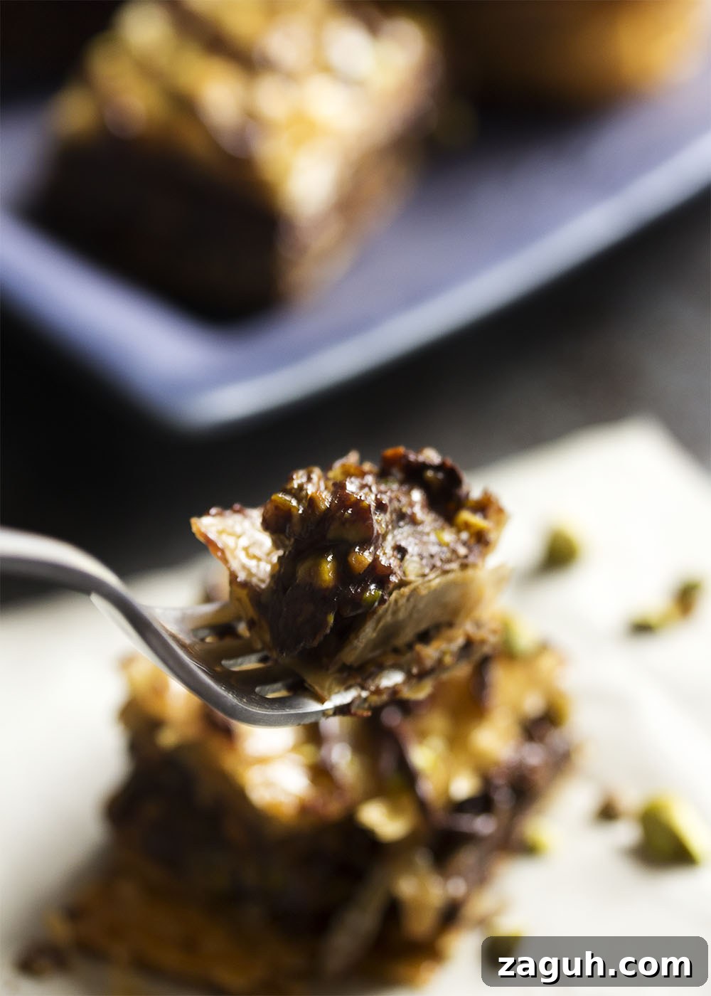 Pistachio Chocolate Baklava: Decadent Layered Dessert Recipe 5 Rich pistachio and chocolate baklava ready to be sliced and served.