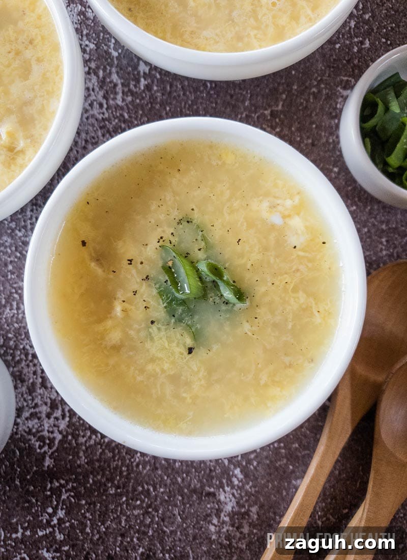 Carnivore Lunch Ideas for Simple Weekly Meal Planning 6 A bowl of egg drop soup, garnished with green onions.