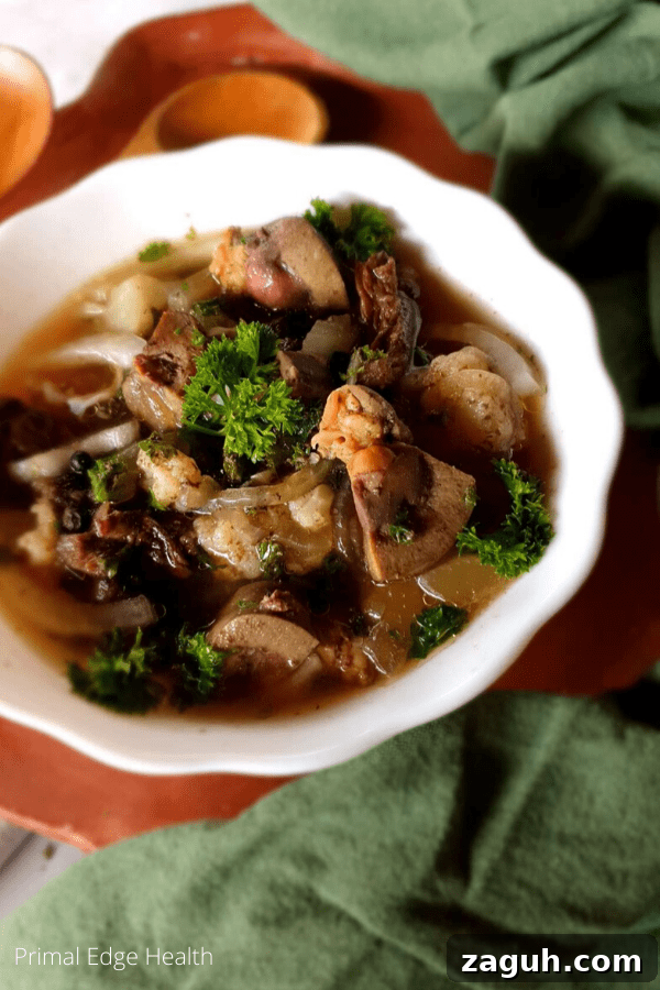 Carnivore Lunch Ideas for Simple Weekly Meal Planning 8 Organ meat stew in a white bowl.