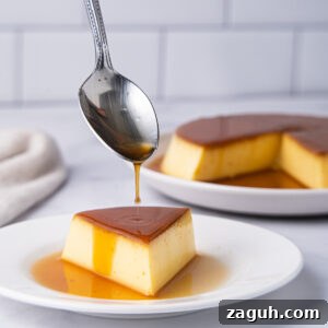 Creamy Vietnamese Bánh Flan Recipe — Classic Caramel Custard 11 Slice of flan with spoon drizzling caramel on top.