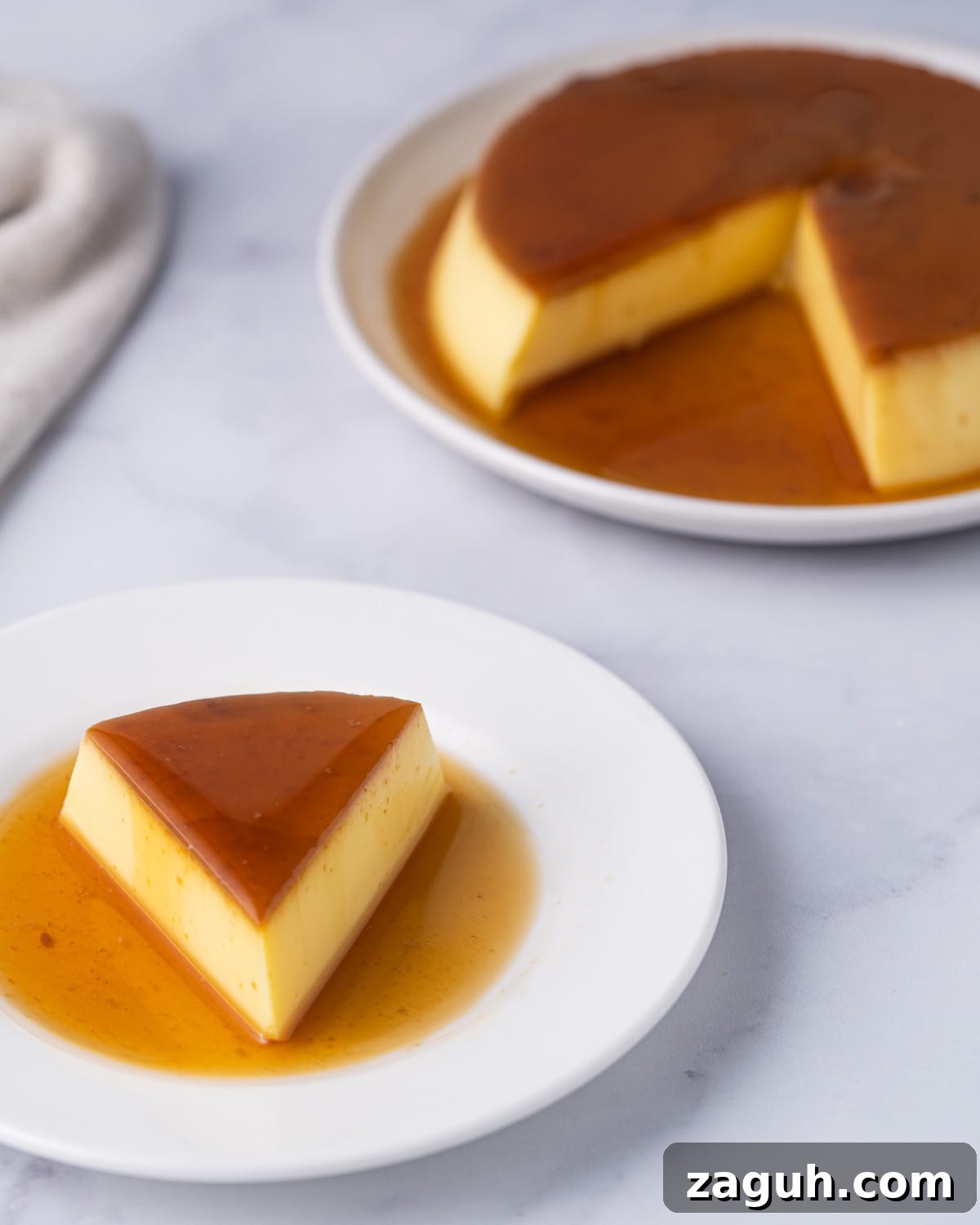 Creamy Vietnamese Bánh Flan Recipe — Classic Caramel Custard 10 Slice of banh flan on a plate and whole flan in the background.