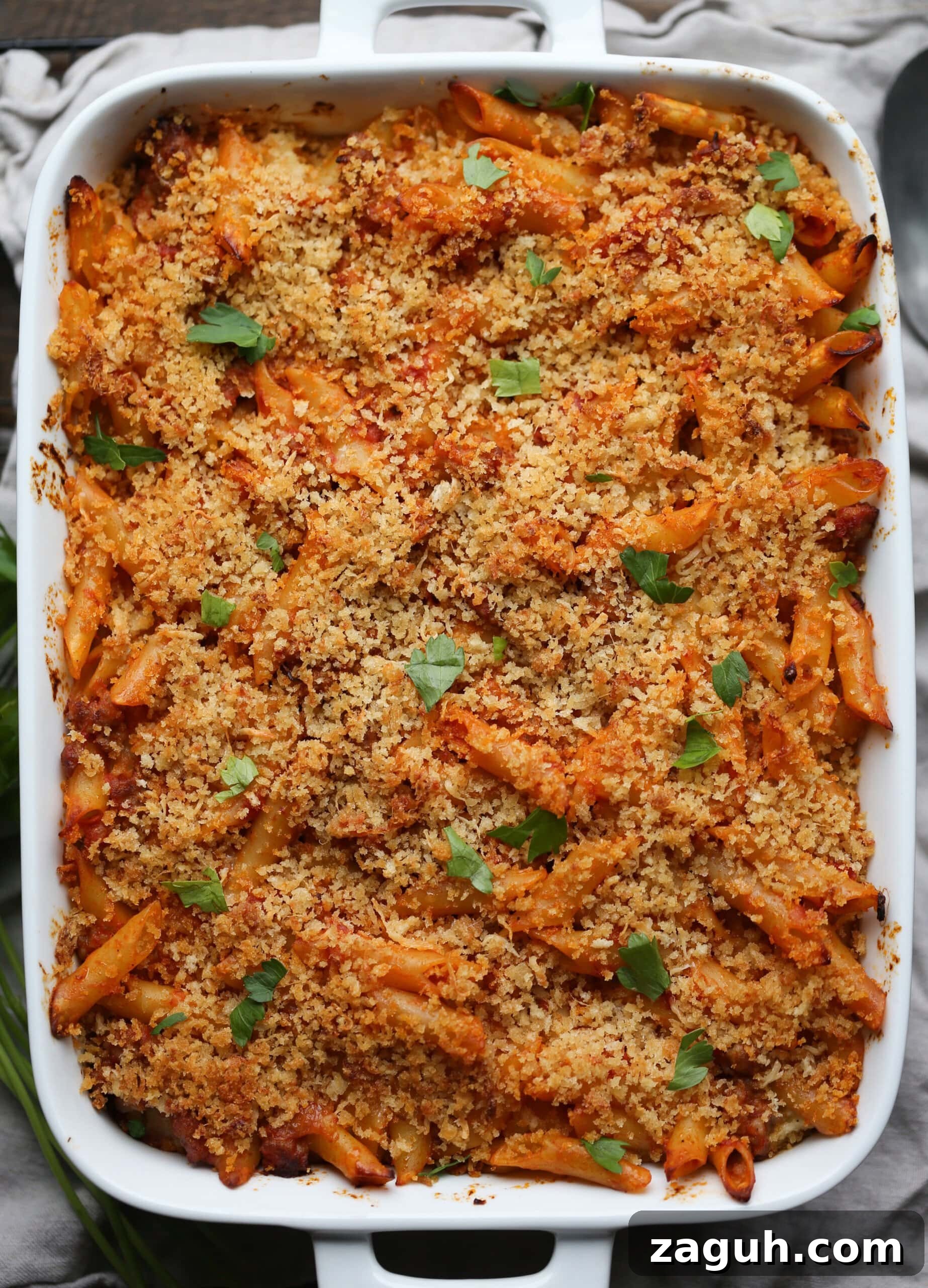 Creamy Baked Mostaccioli with Melted Cheese 12 Baked mostaccioli topped with parmesan cheese, breadcrumbs and fresh herbs.