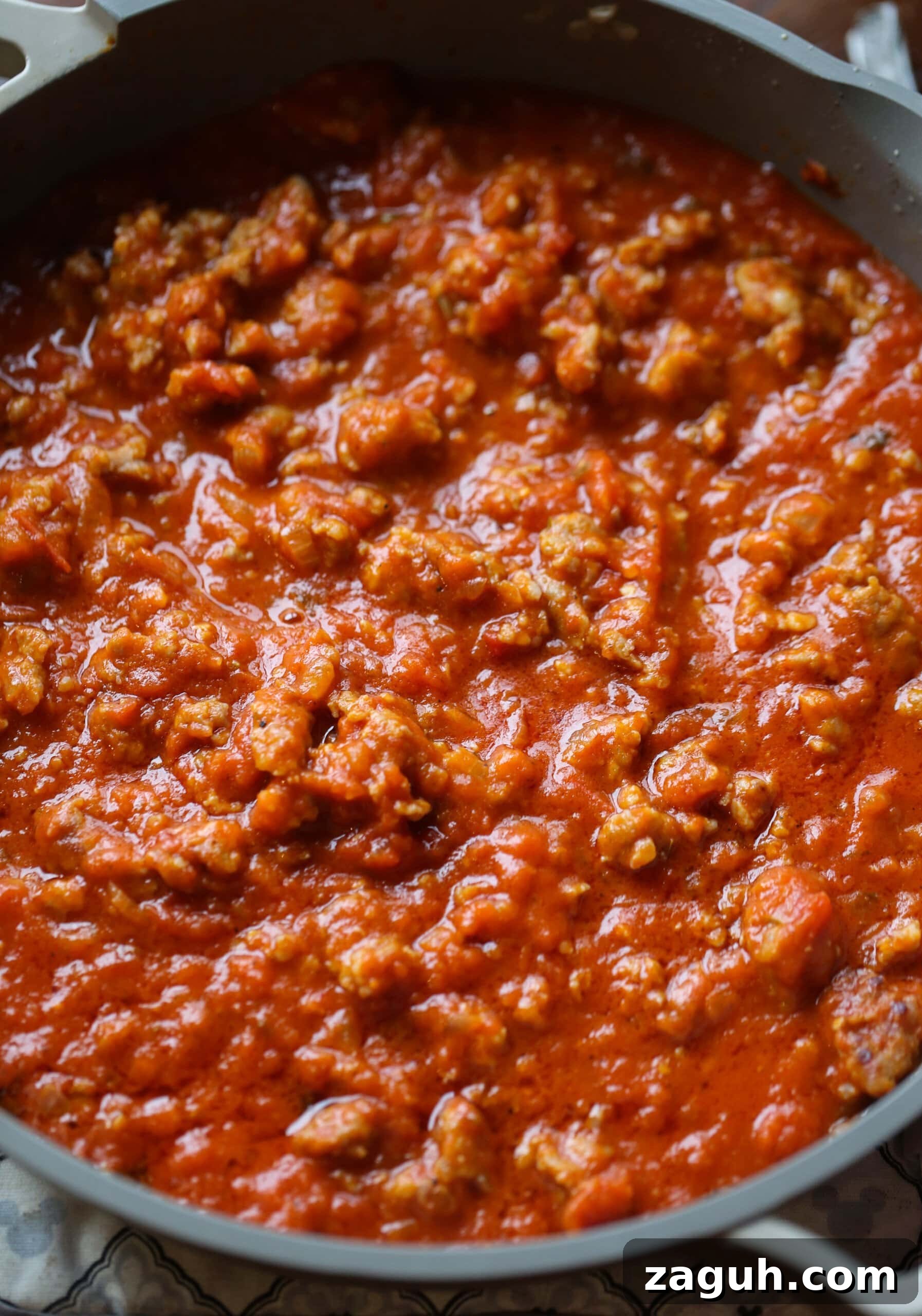 Creamy Baked Mostaccioli with Melted Cheese 5 Italian sausage combined with marinara for the meat sauce.