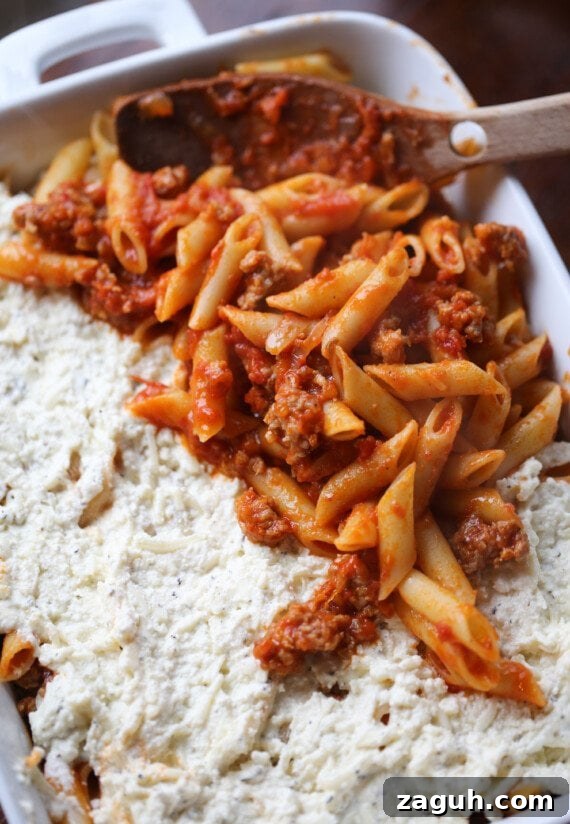 Creamy Baked Mostaccioli with Melted Cheese 10 A pasta layer is added on top of the ricotta cheese layer.