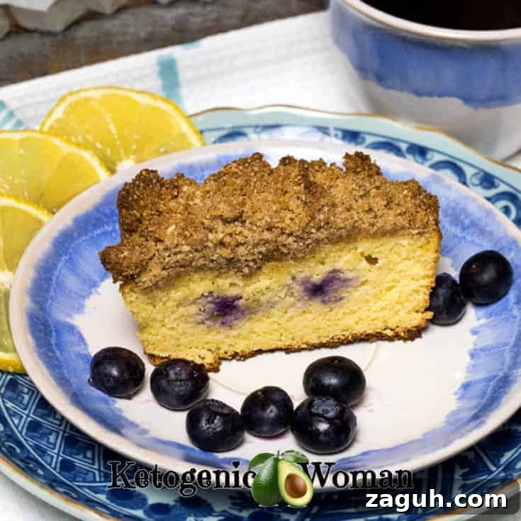 Coffee with Low Carb Lemon Blueberry Coffeecake with a crumb topping on blue and white plate set