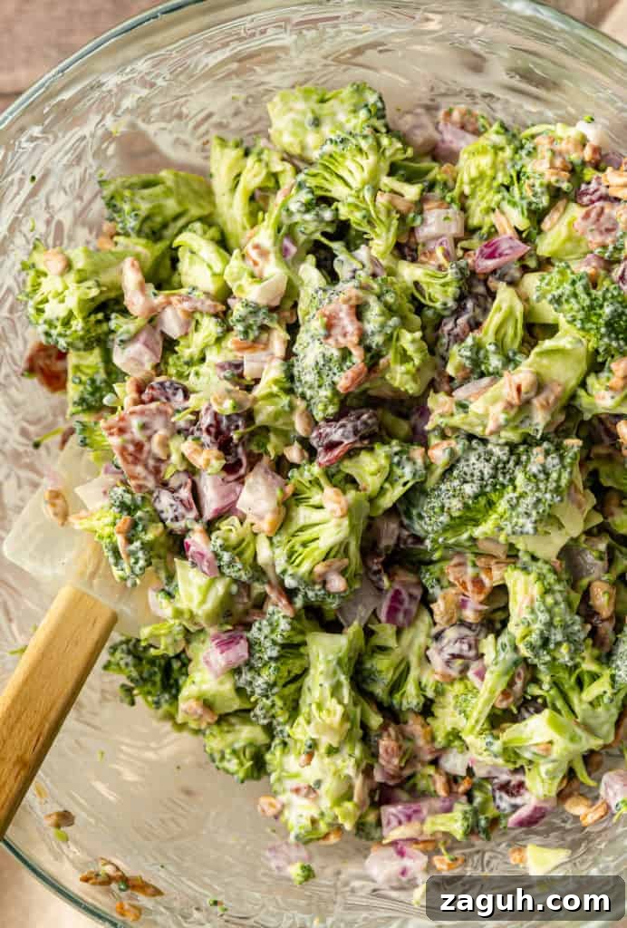 Crunchy Broccoli Salad with Bacon and Creamy Parmesan Dressing 4 Mixing up broccoli crunch salad like from Whole Foods