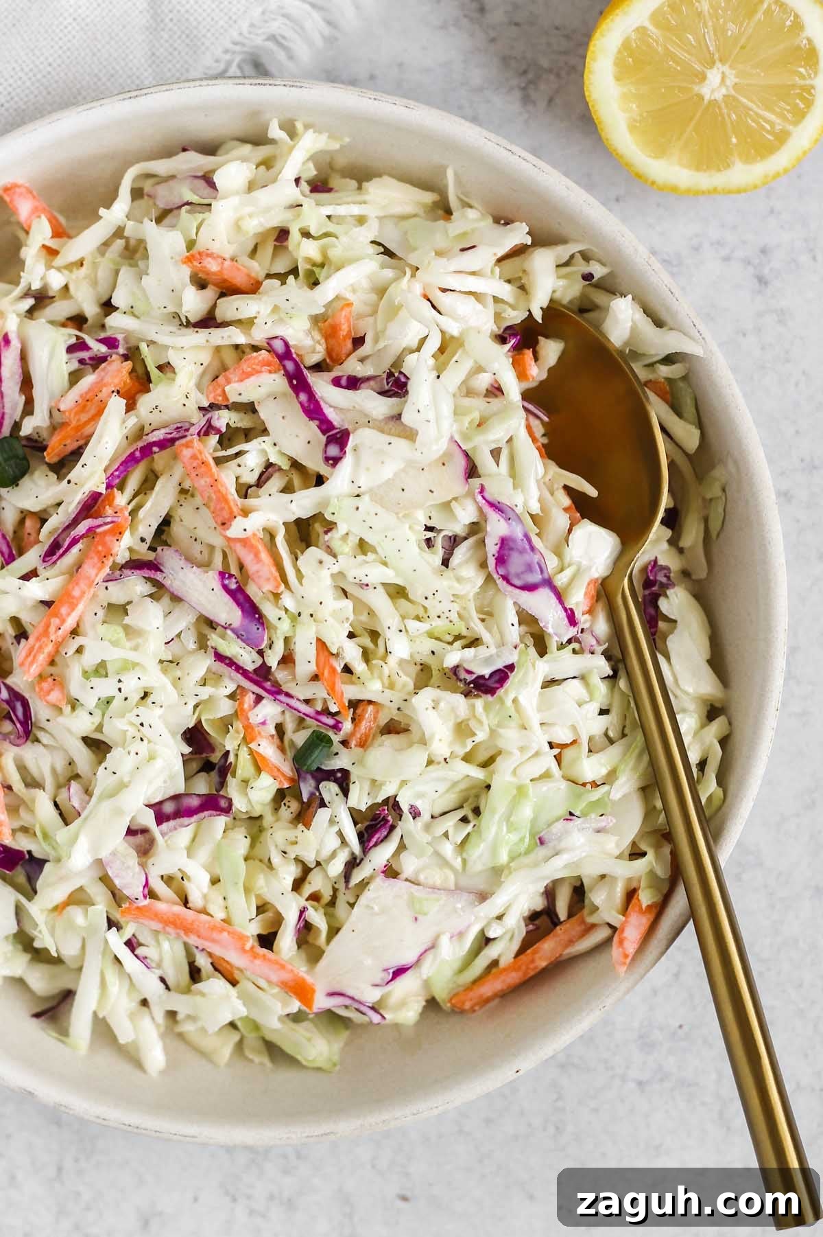 Creamy Paleo & Whole30 Coleslaw Recipe for Simple Sides 8 Close up of Whole30/Paleo coleslaw in a serving dish.