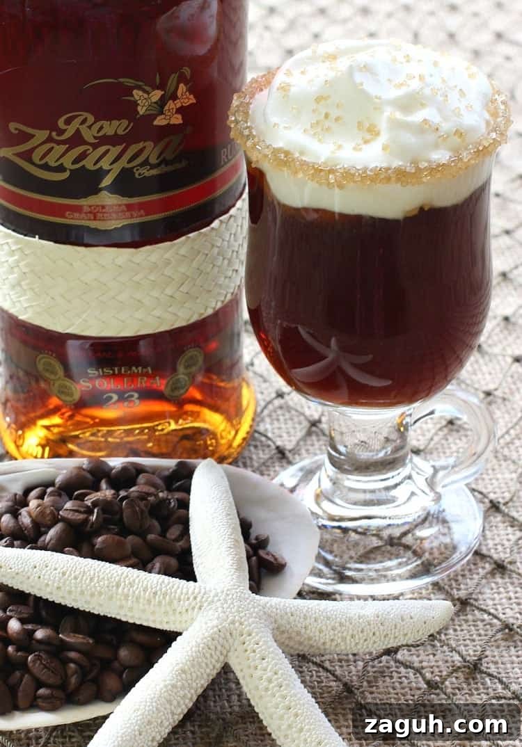 This Banana Rum Coffee is my kind of coffee. Perfect for brunch or an after dinner drink, strong and sweet with a hint of banana flavor! Island Coffee Drink with bottle