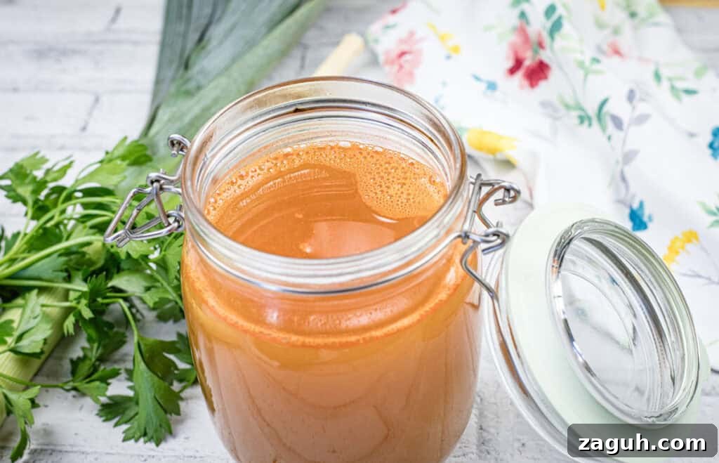 31 Bold Seafood Recipes for Big Flavor with Simple Ingredients 17 A glass jar filled with shrimp stock.