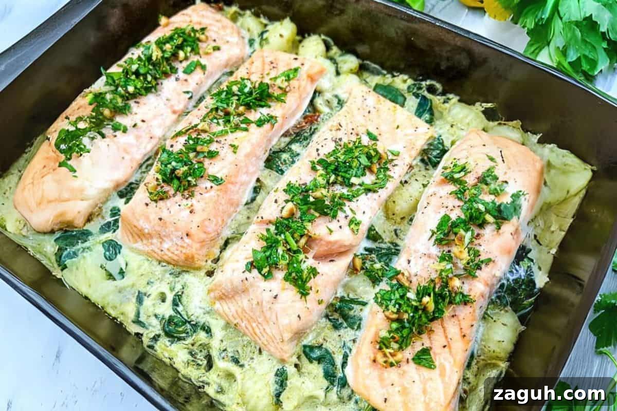 31 Bold Seafood Recipes for Big Flavor with Simple Ingredients 19 Salmon Gnocchi Bake with Gremolata on a dish.