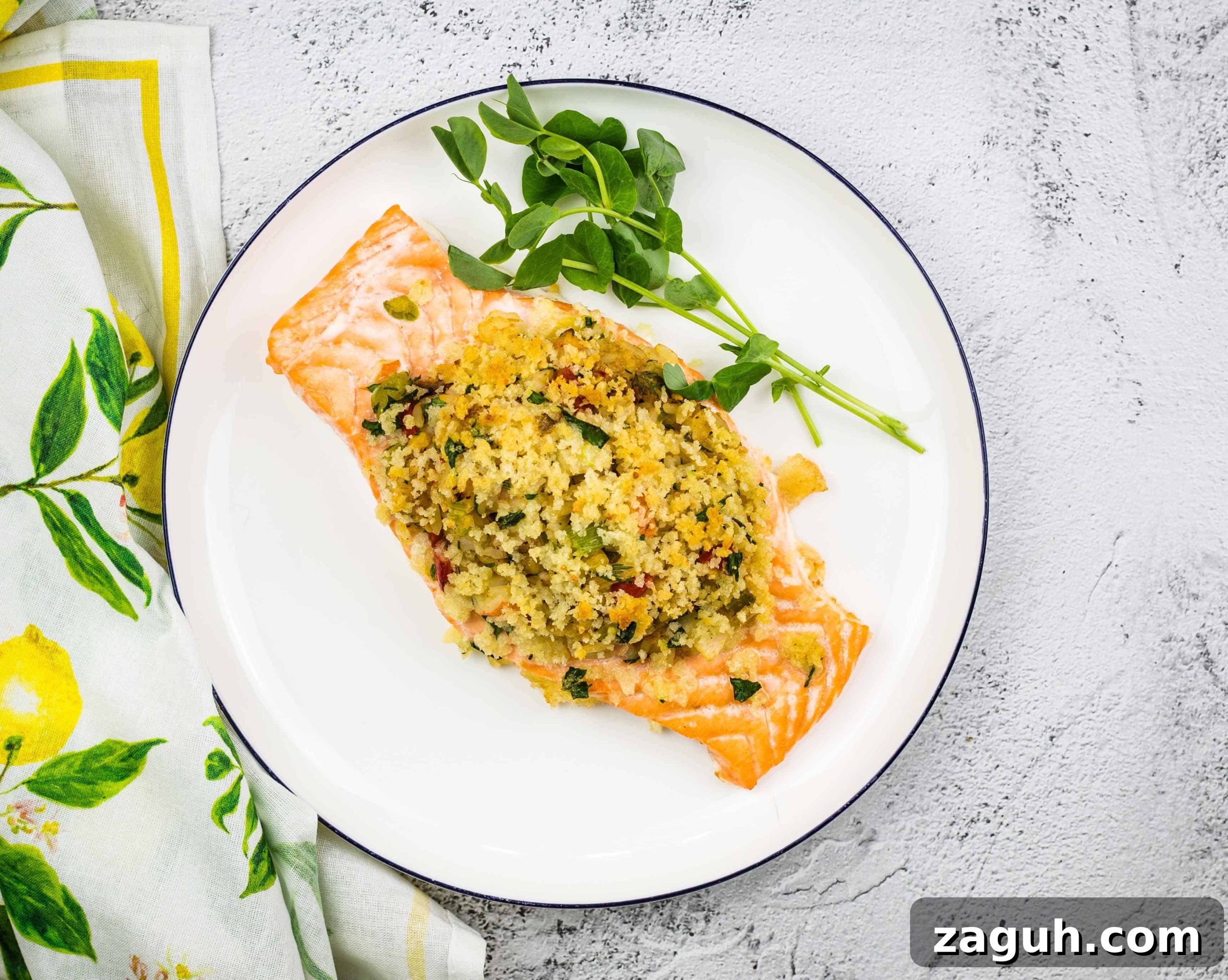31 Bold Seafood Recipes for Big Flavor with Simple Ingredients 31 Seafood Stuffed Salmon on a circular white plate.