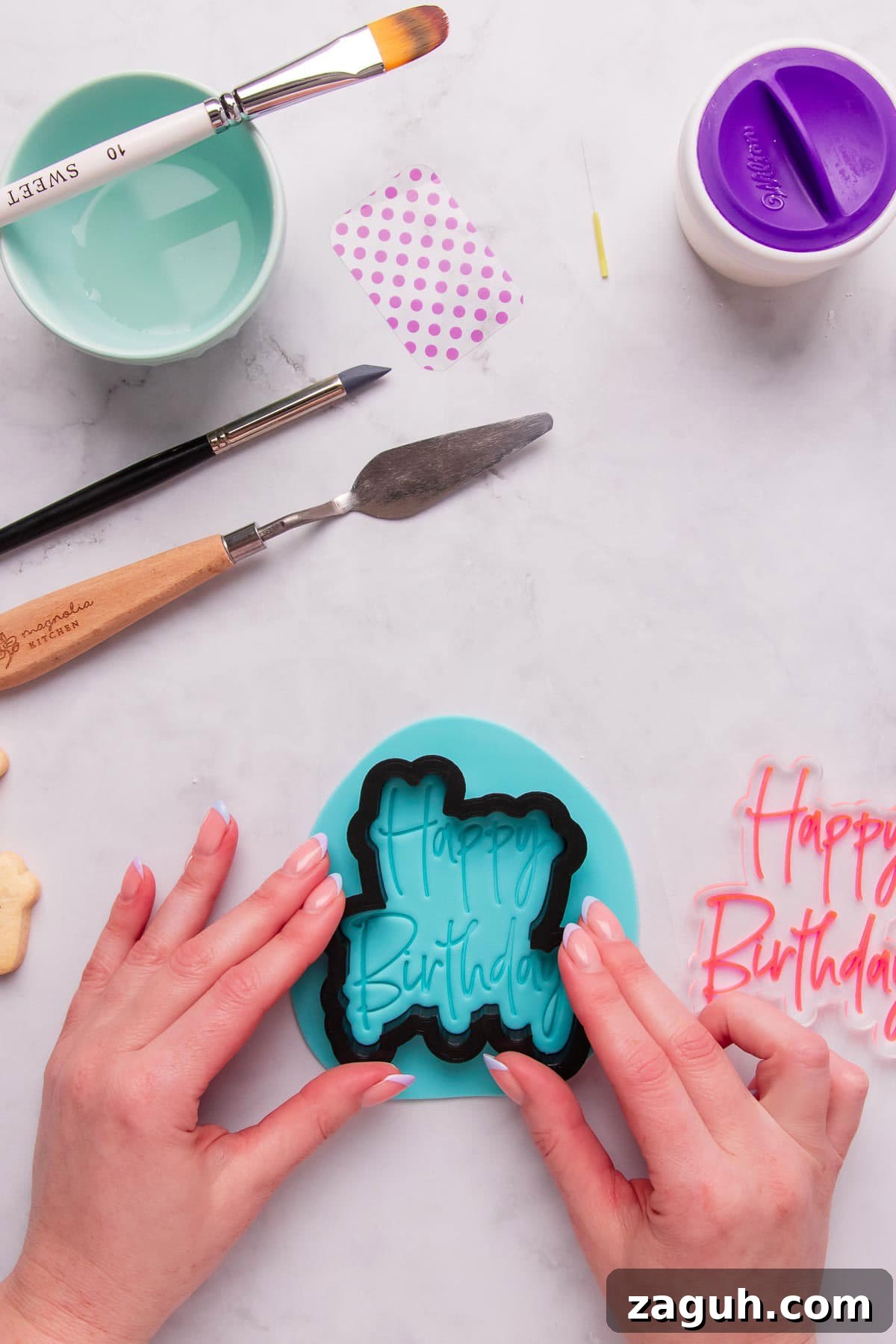 Stamped Fondant Cookies: Step-by-Step Guide for Beautiful Designs 8 Cutting and placing stamped fondant onto cookies.