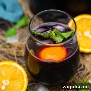 Crisp Red Wine Spritzer Recipe: Refreshing Summer Cocktail 9 Red Wine Spritzer served in a glass.