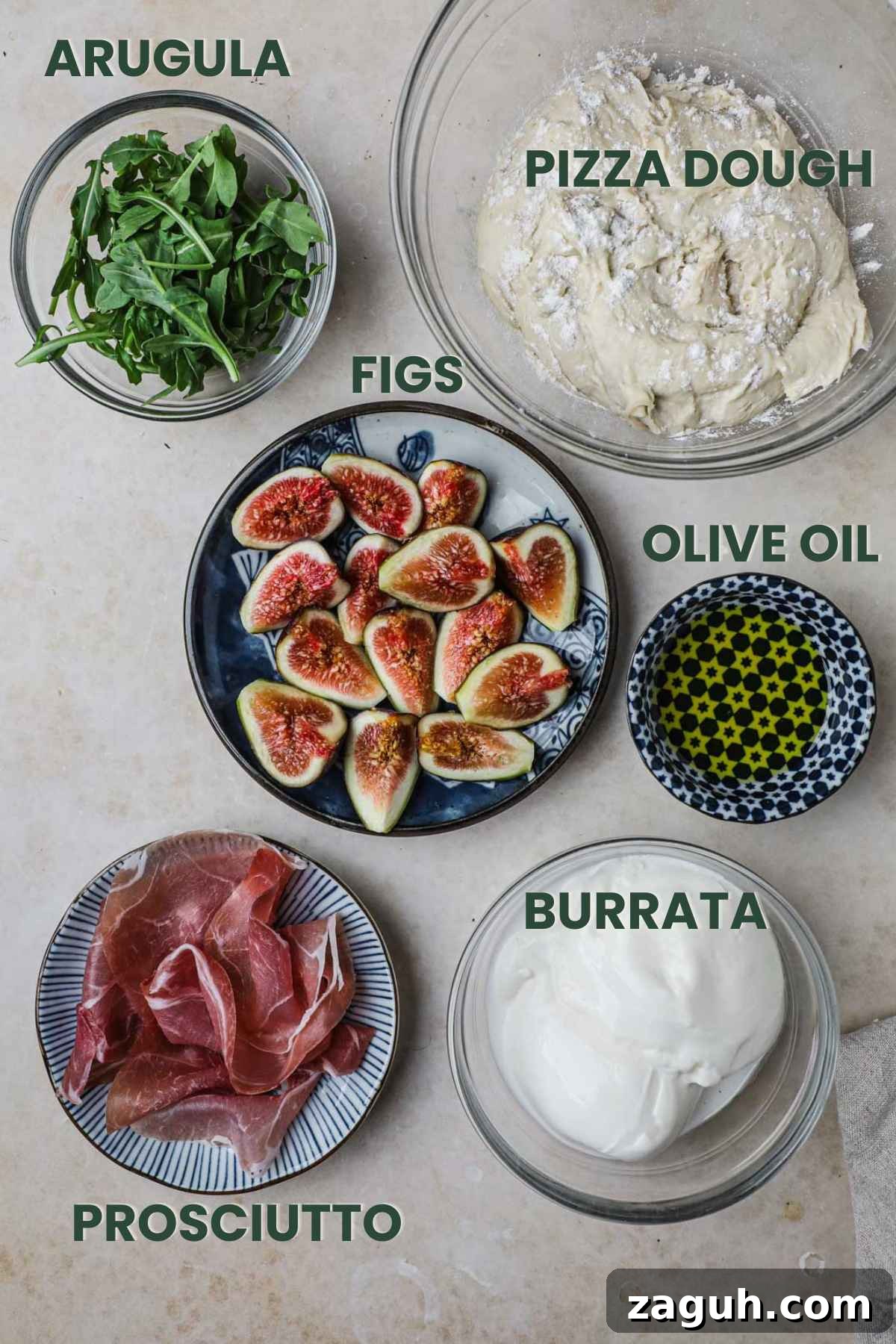 Fig, Burrata & Prosciutto Pizza with Honey and Arugula 3 Ingredients for white fig pizza, figs, prosciutto, pizza dough, burrata, olive oil, arugula.