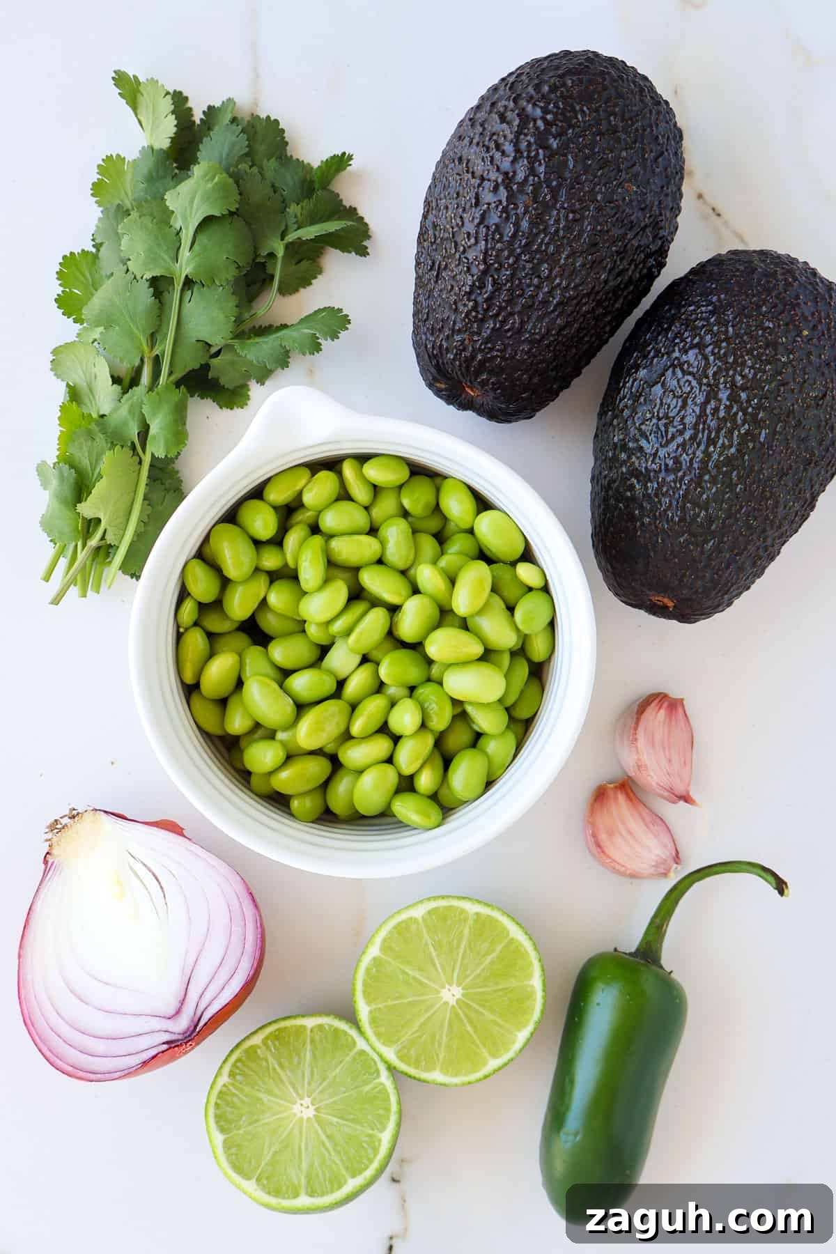 Protein-Packed Edamame Guacamole Recipe for Muscle Fuel 4 Ingredients shown to make guacamole.