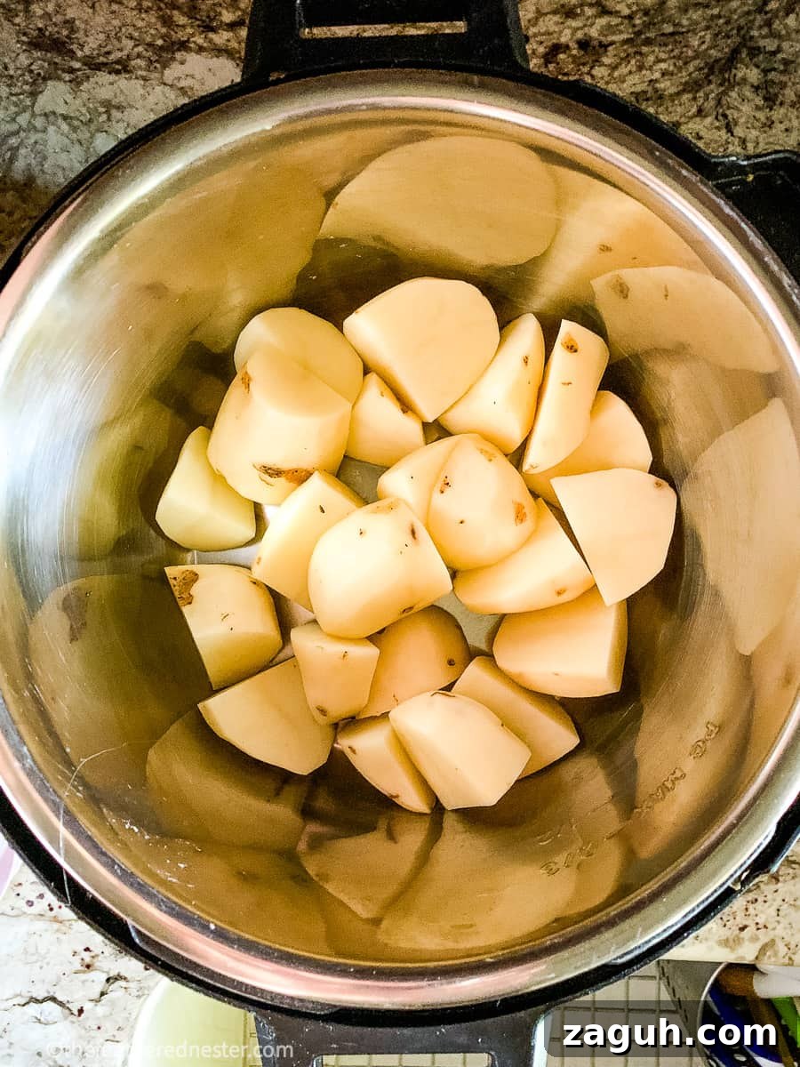 Instant Pot Mashed Potatoes Without Draining 3 Peeled and cut potatoes in Instant Pot pressure cooker.