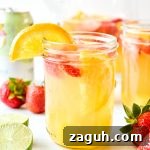 Refreshing Summer White Wine Sangria Recipe for Warm Evenings 7 mason jar of white wine sangria.